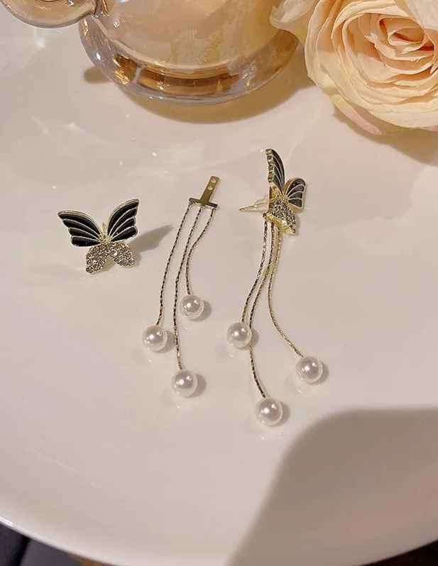 Long Pearl Butterfly Earring shop now